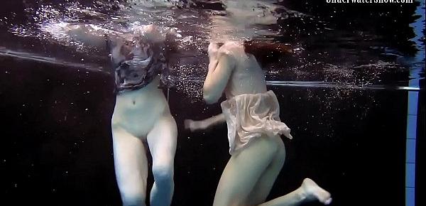  Two girls swim and get naked sexy